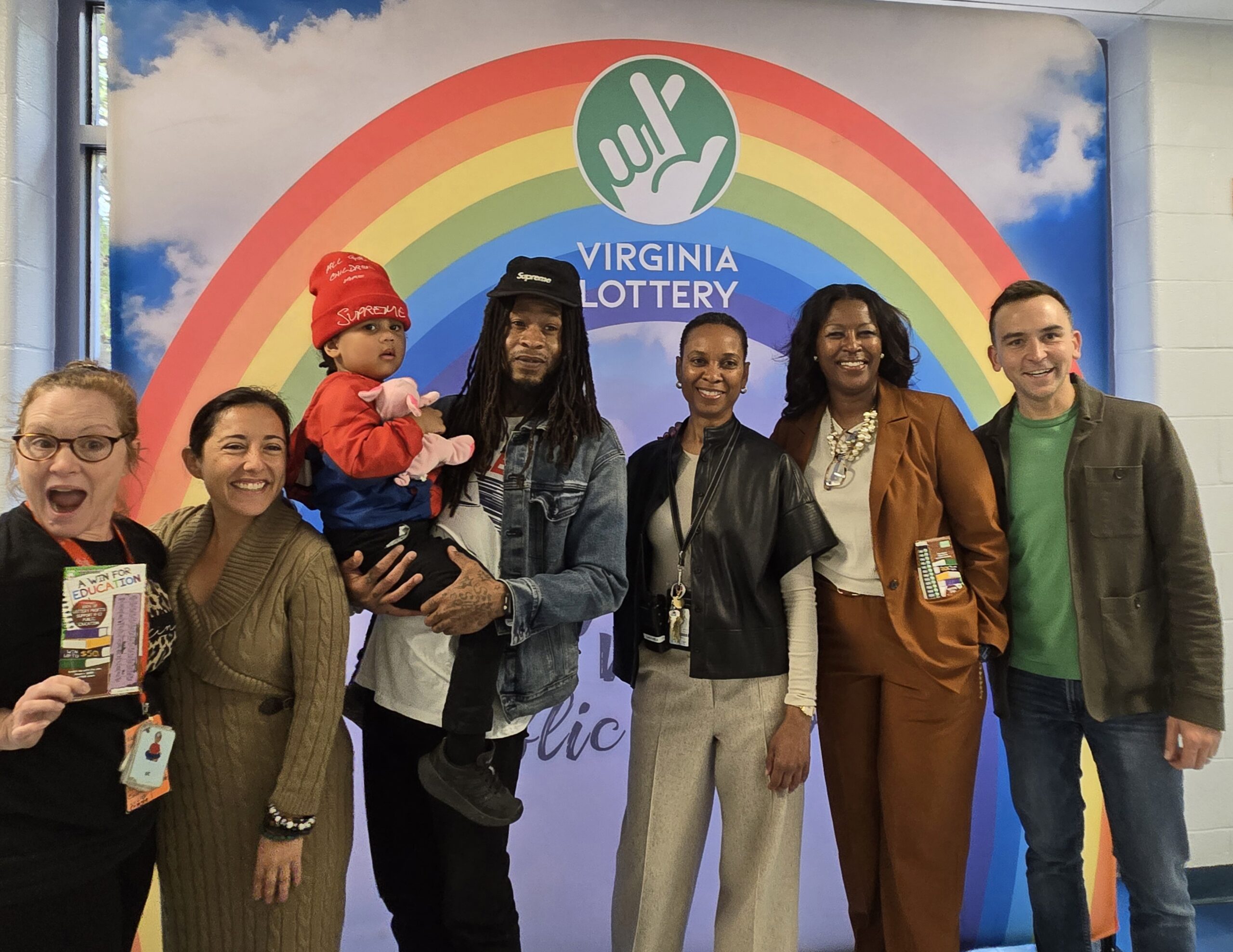 Picture of Drew Elementary Staff with Tommy McFLy for teacher tour surprise