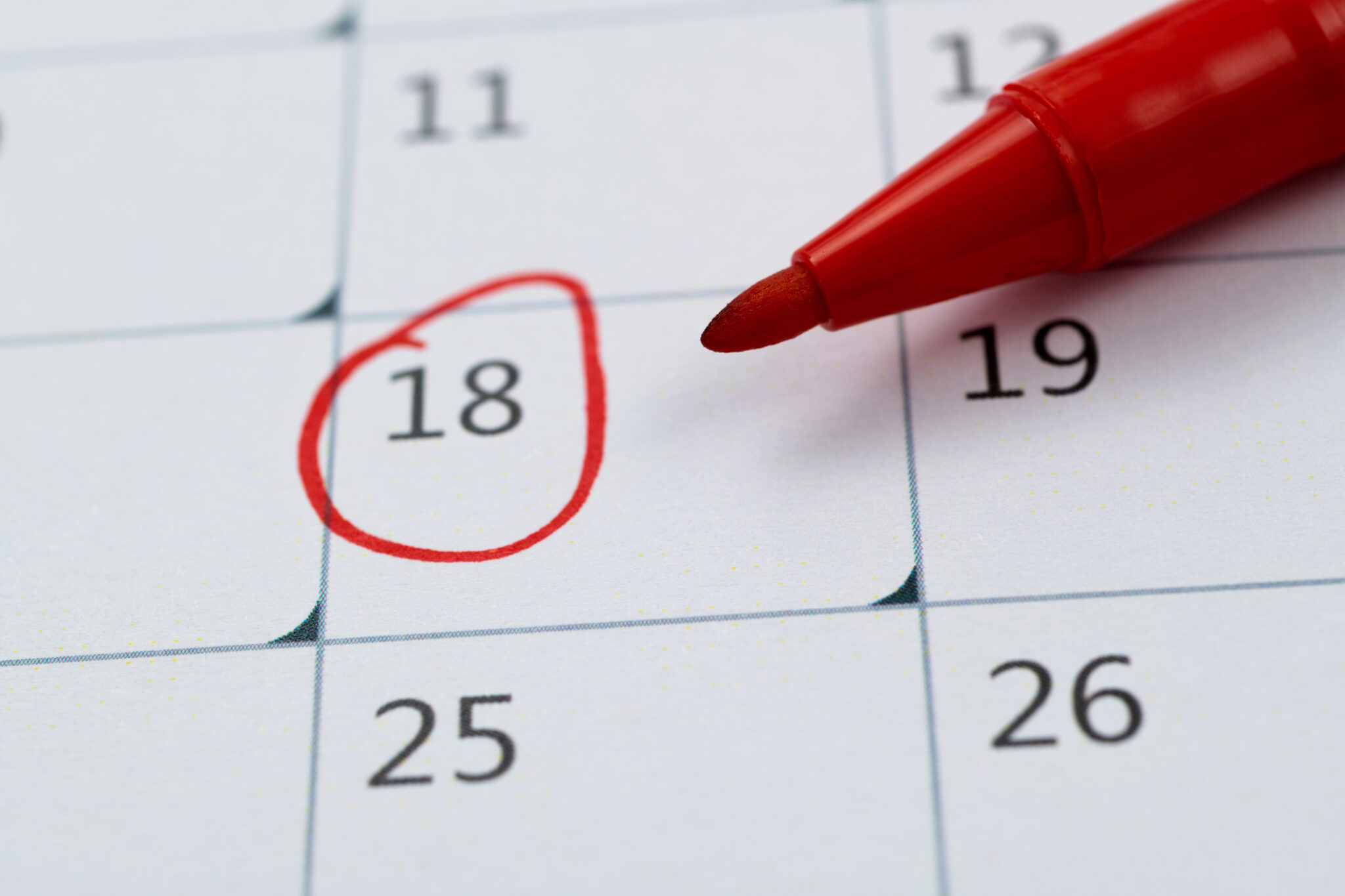 picture of calendar with red marker on 18